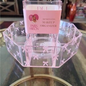 Paris Hilton Pink Clear Rotating Makeup Caddy with Bow Accents